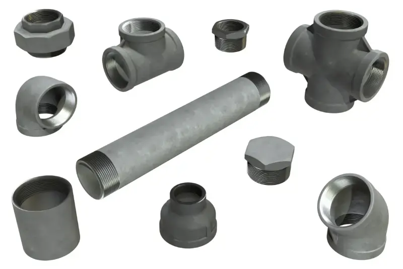 Assorted carbon steel pipe fittings, including elbows, tees, couplings, and connectors, showcasing durable and corrosion-resistant industrial components for fluid and gas systems.